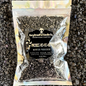 A sealed silver bag of Gory Dreadful Candle Co Prosecc-Ho-Ho-Ho Sizzling Room Salt Crystals with a holographic design and branding information on the label.