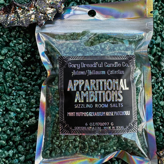 A package of 'Apparitional Ambitions' scented salt crystals by Gory Dreadful Candle Co. with holographic packaging, designed for use as potpourri.